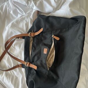 Roots Black and Tan Travel Bag